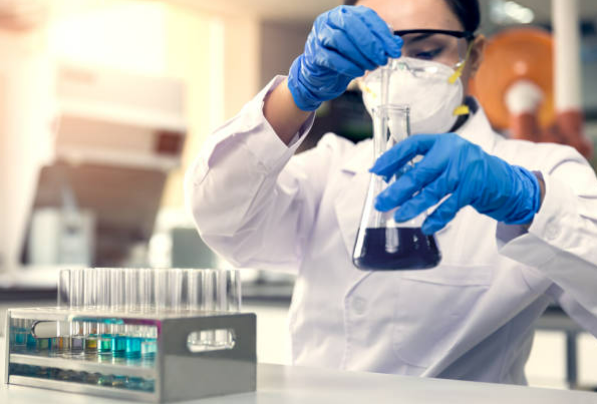 Laboratory research scientist conducting chemical analysis